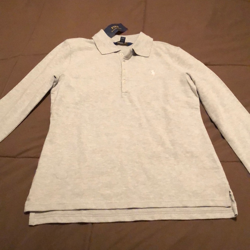 Long sleeved never worn polo shirt with tags.